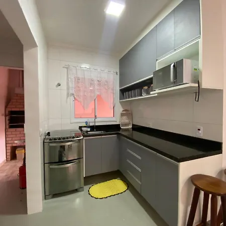 Casa em Bertioga condomínio 250 metros da praia Exterior foto
